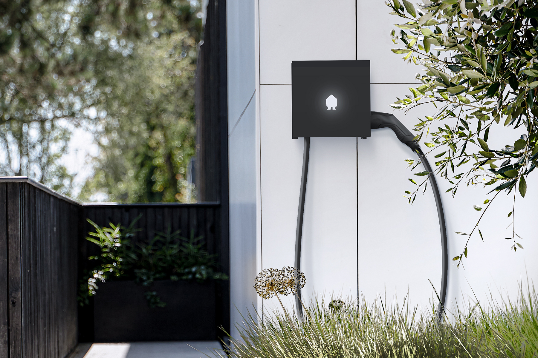 Installation résidentielle d'une borne de recharge murale Smappee EV Wall noire par NBR Elec à Chastre.